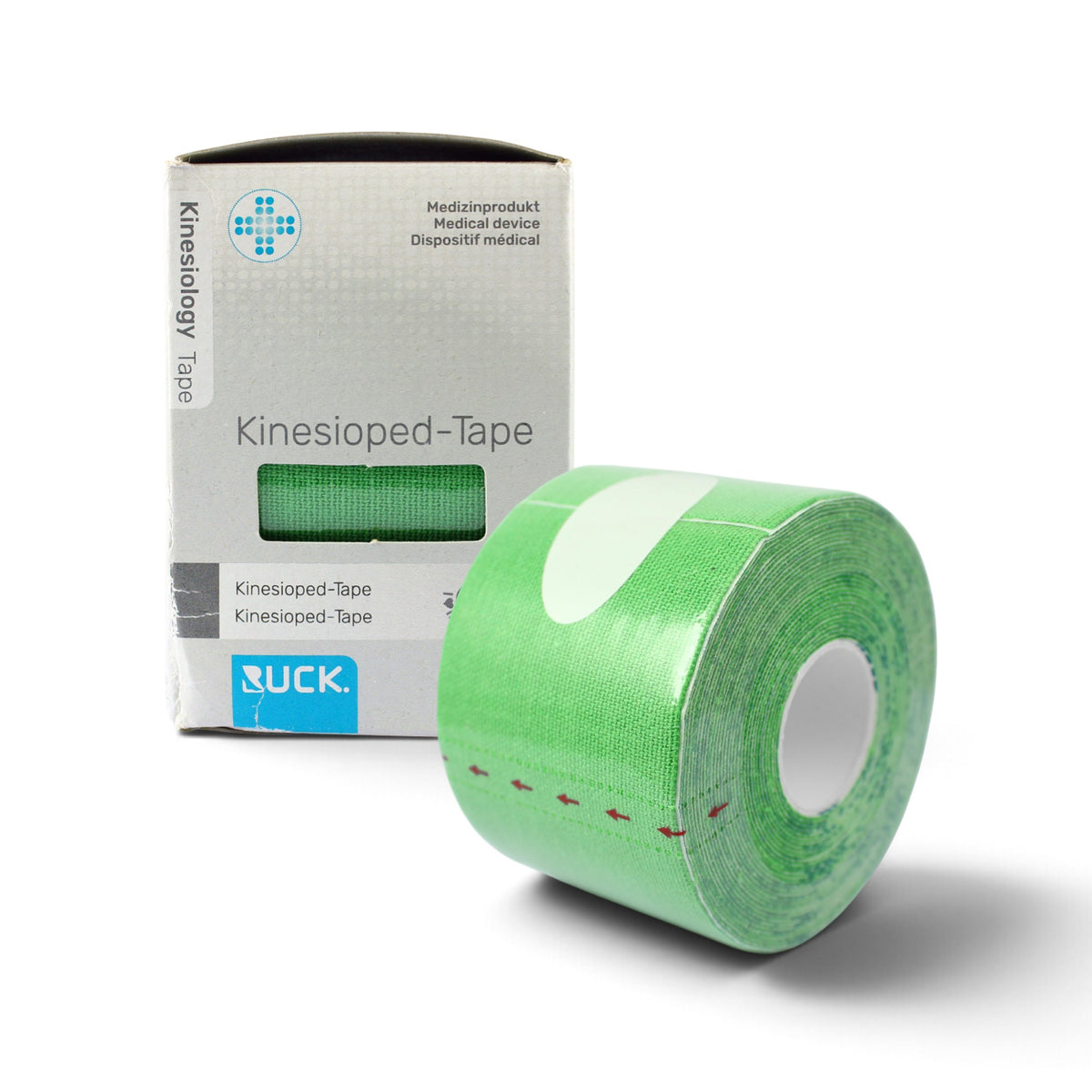A roll of green RUCK Kinesioped Kinesiology Tape placed in front of its white and blue retail box on a clean white background
