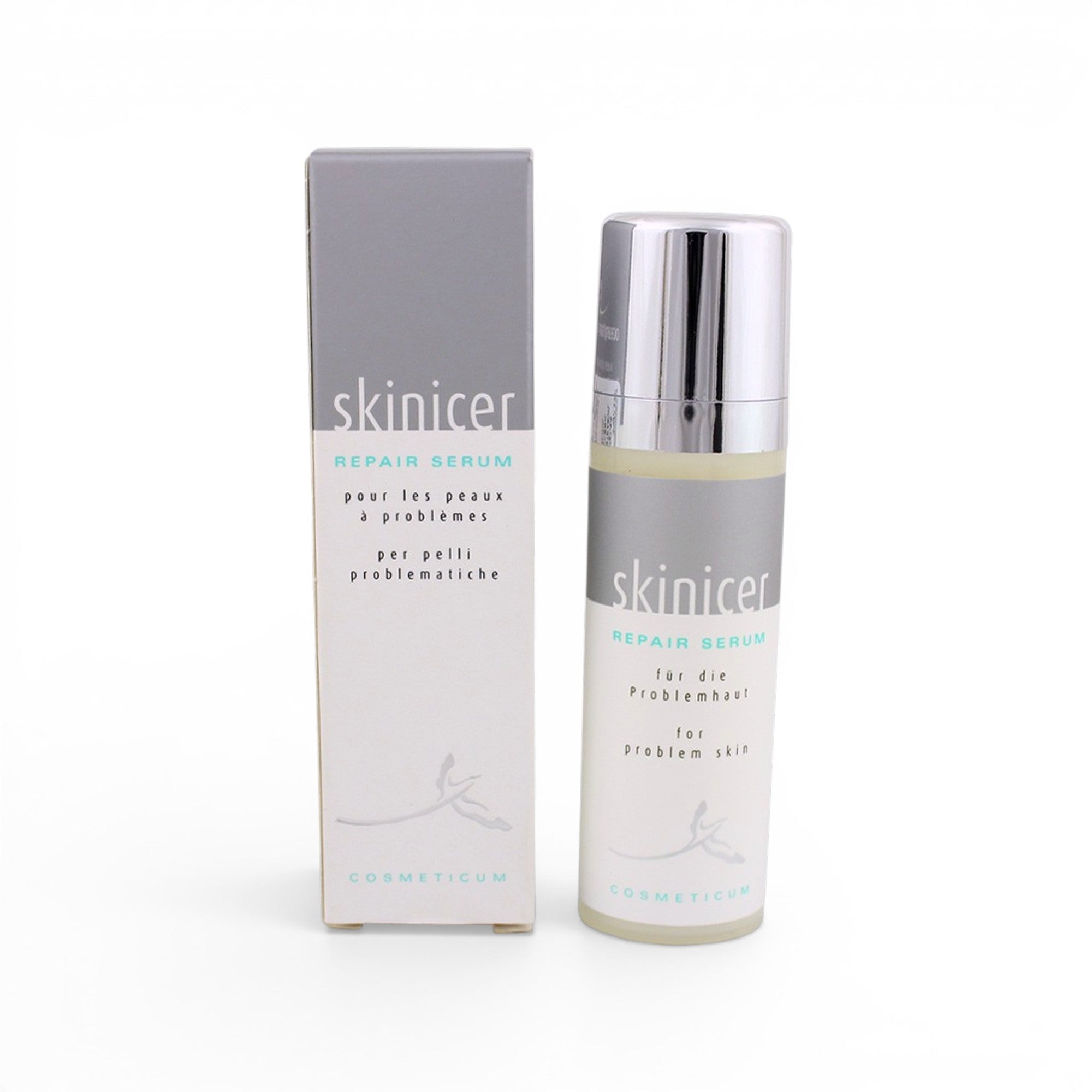 skinicer repair serum bottle and packaging on a white background