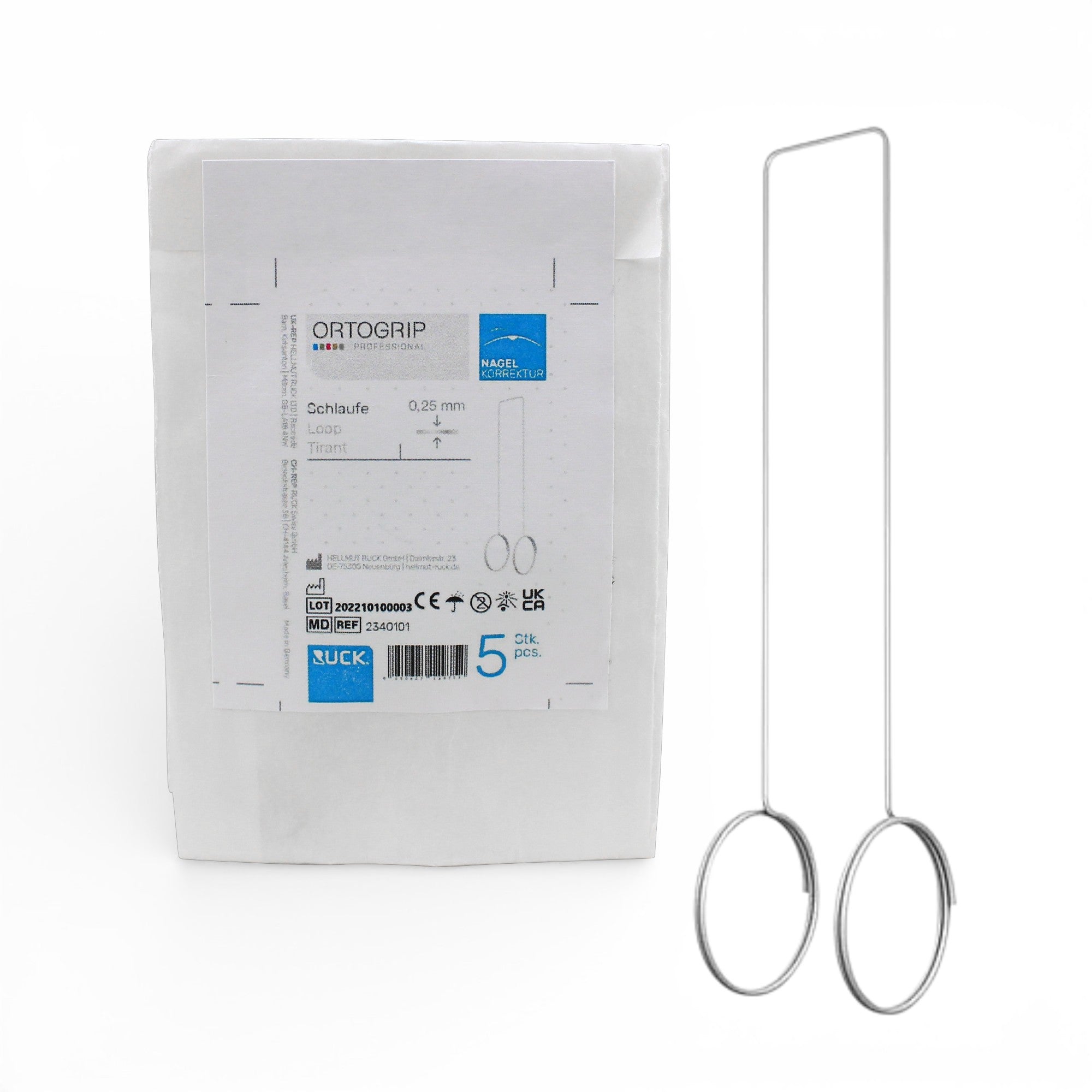 Metallic ring with packaging labeled 'ORTOGRIP' on a white background
